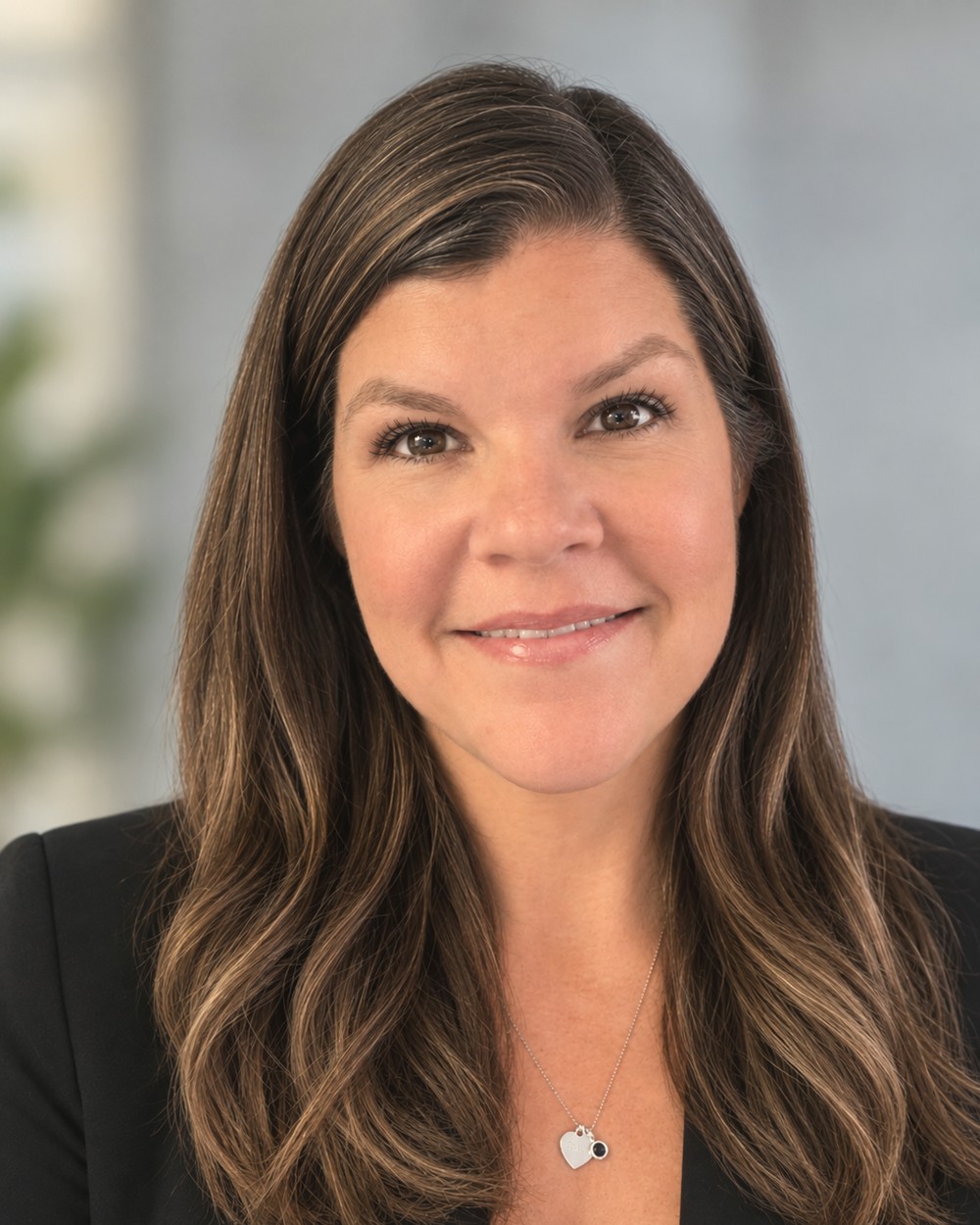 Kelly, professional organizer and founder of Stacked and Sorted
